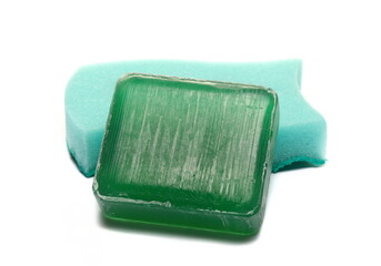 Glycerin soap and green sponge isolated on white  