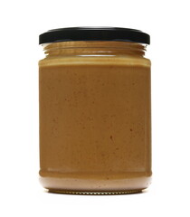 Peanut butter in glass jar isolated on white