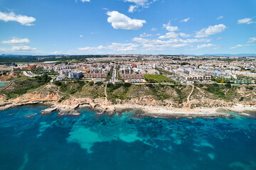 Obraz premium Aerial drone point of view Cabo Roig coastline. Spain