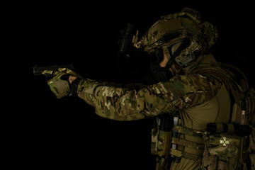 SOF special forces soldier wearing US made gear, crye precision, ops core. Studio portrait ...