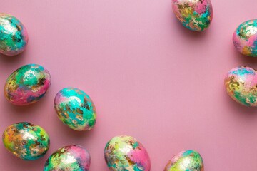 Minimalistic Easter composition. Golden paint eggs on pink background. Greeting trendy color concept. Top view, copy space.