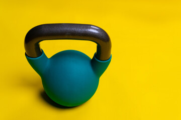 For Kettlebell yellow background Blue with space on a text space iron, for cast lifting in...