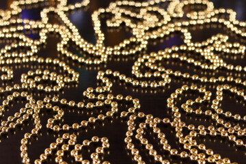 Golden explosion .Luxury background with golden glitter sparkles. Shiny poster. Glitter bokeh lights. Magic poster. Holiday background. Golden Christmas  texture. Happy New Year. Luxury glitter 