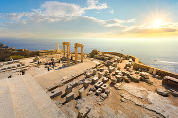 Sunset view of the sea from the ancient Greek ruins of the Lindos Acropolis on the island of...