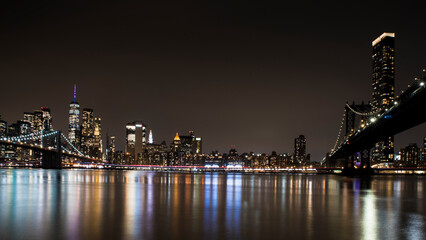 Fototapeta na wymiar Night lights - Skyline of Manhattan from Brooklyn. New York City. NYC