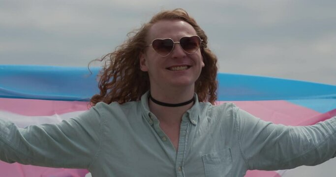 Proud and Happy Transwoman with a trans flag