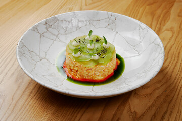 beautiful modern canned food with kiwi and herbs