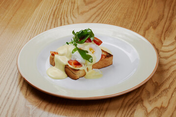 delicious breakfast sandwich with ham and salmon, cheese, egg, vegetables