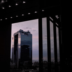 Naklejka premium Landscape of metropolice. Twilight, structure and poker face.