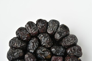 Arabic dates, ajwa dates on the white
