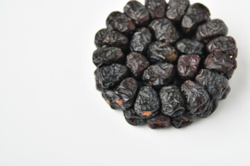 Arabic dates, ajwa dates on the white
