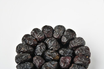 Arabic dates, ajwa dates on the white
