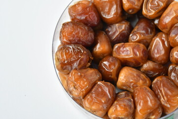 Arabic dates, sugary dates on the white
