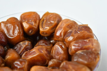 Arabic dates, sugary dates on the white
