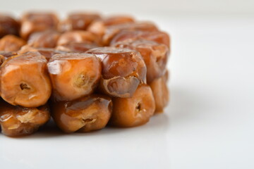 Arabic dates, sugary dates on the white
