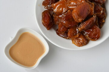 Fresh Arabian dates (Khalas dates ) isolated on white background