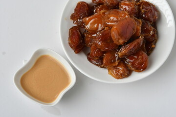 Fresh Arabian dates (Khalas dates ) isolated on white background