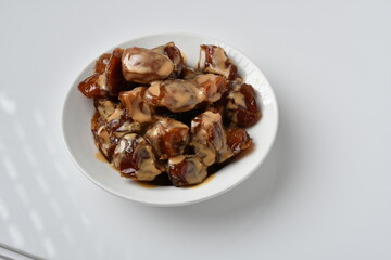 Fresh Arabian dates (Khalas dates ) isolated on white background