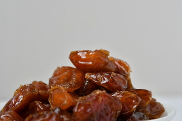 Fresh Arabian dates (Khalas dates ) isolated on white background