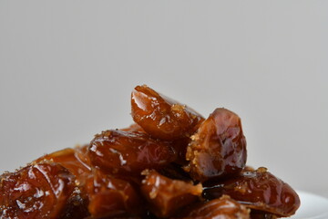 Fresh Arabian dates (Khalas dates ) isolated on white background