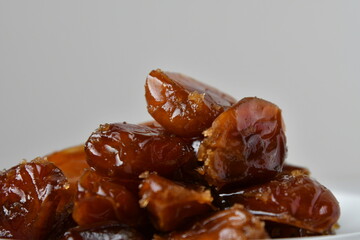 Fresh Arabian dates (Khalas dates ) isolated on white background