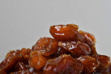 Fresh Arabian dates (Khalas dates ) isolated on white background