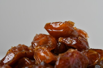 Fresh Arabian dates (Khalas dates ) isolated on white background