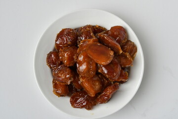 Fresh Arabian dates (Khalas dates ) isolated on white background