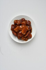 Fresh Arabian dates (Khalas dates ) isolated on white background