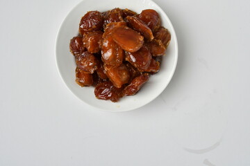 Fresh Arabian dates (Khalas dates ) isolated on white background