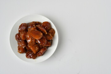 Fresh Arabian dates (Khalas dates ) isolated on white background