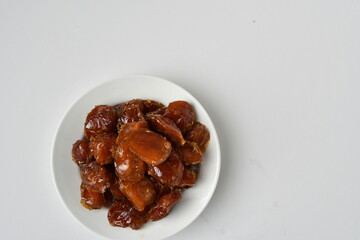 Fresh Arabian dates (Khalas dates ) isolated on white background