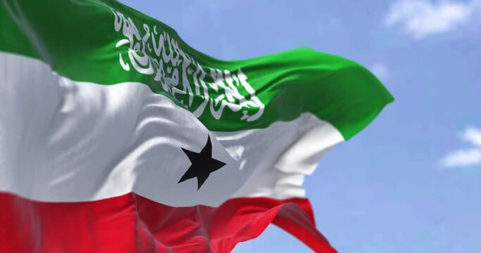 side close-up view of Somaliland national flag waving in the wind. Seamless loop in slow motion