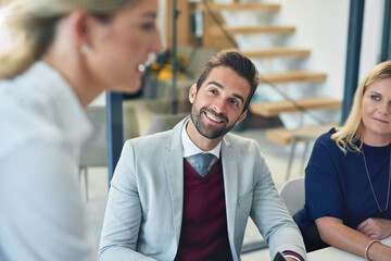 Theyre all an inspiration to each other. Cropped shot of a businessman in a boardroom meeting with his colleagues.