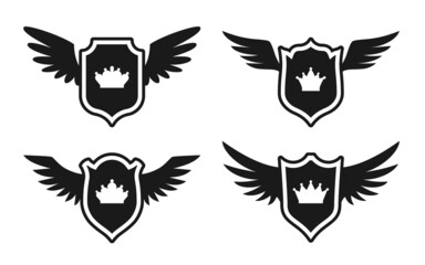 Shield wing crown emblem badge black glyph set. Elegant military emblem protection security. Award high quality dynasty coat arms stamp gothic guarantee. Heraldry retro banner medieval isolated