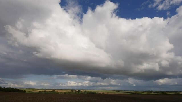 Peaceful time lapse clouds in Oxfordshire, gathering storm