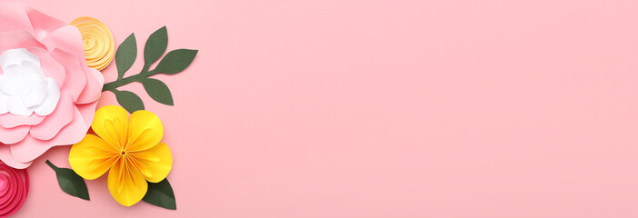 Naklejka premium Beautiful handmade paper flowers on pink background with space for text
