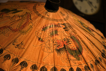 An old Chinese dragon-decorated umbrella