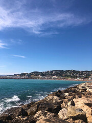 Fototapeta na wymiar Scenic crowded view of Prado beach on beautiful sunny summer day in Marseille France