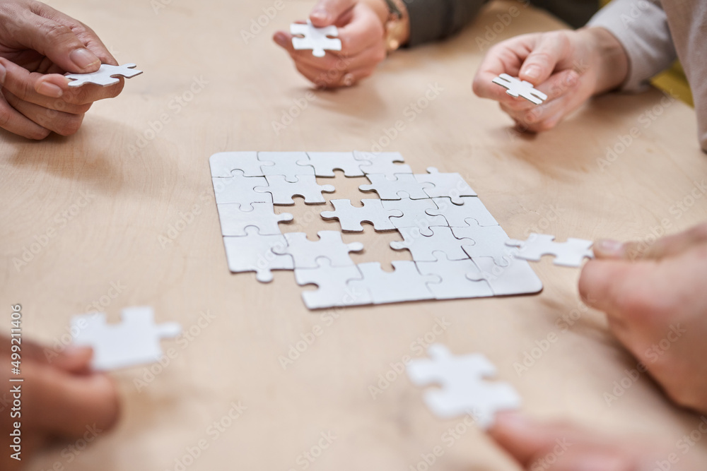 Poster business is a game of strategy and innovation. cropped shot of an unrecognizable group of businesspe
