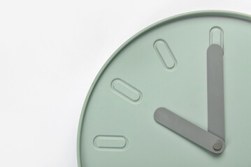 New modern clock on white background, closeup