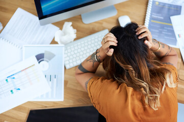 I am way too stressed today. Cropped shot of an unrecognizable businesswoman suffering from a...