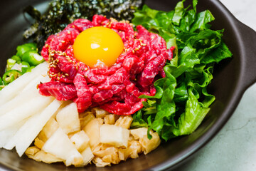 Yukhoebibimbap, Korean style Beef Tartare Bibimbap : This is a bowl of rice topped with seasonal...