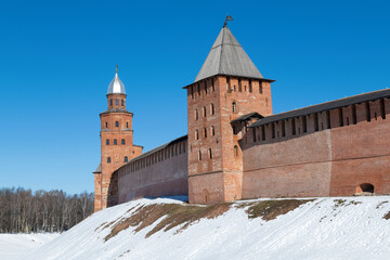 Two ancient towers of the Detinets of Veliky Novgorod on a sunny March day. Russia