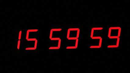 Digital timer on a black background. Light panel with red numbers