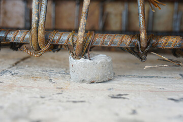 The spacer is used in concrete structures to support reinforcement steel so that the nominal cover between the reinforcement and formwork is maintained before and after concreting.