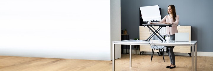 Adjustable Height Desk Stand In Office