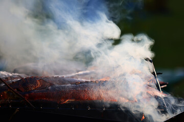 smoked fish sturgeon smoke in the smokehouse