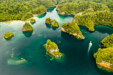 The beauty of Indonesia. High angle shot of a little islets and islands in the middle of Indonesia.
