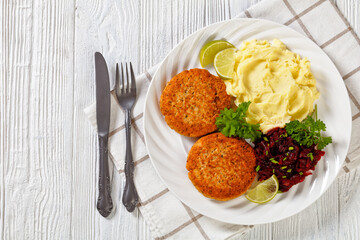 salmon patty with potato mash and beetroot salad